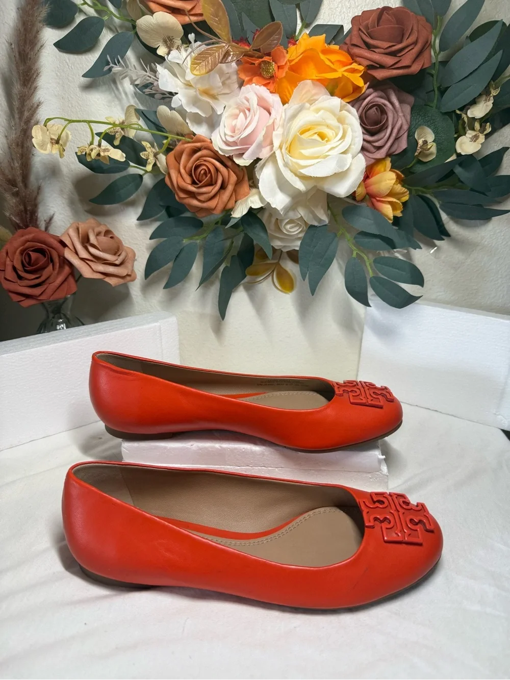 Tory Burch Bright Orange Embossed Logo Ballet Flats